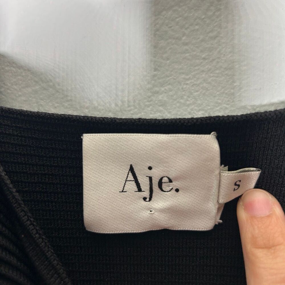 Aje. Corinne Ruffled Ribbed Crop Top - Black - Picture 9 of 11